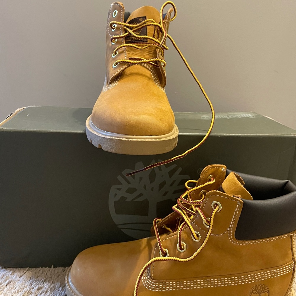 Never worn! Size 1.5 kids Wheat Timberland with Original Box.